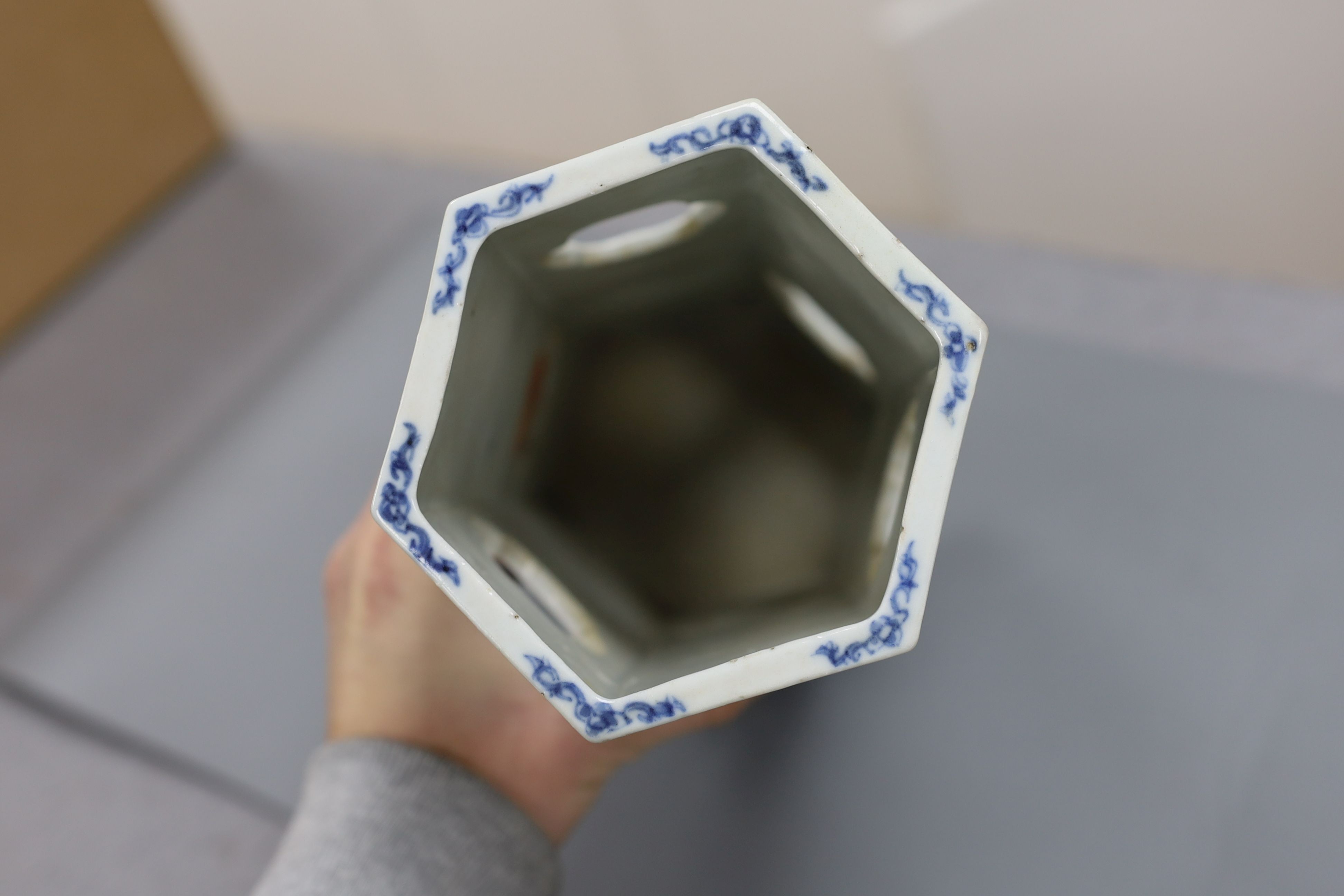 A Chinese blue and white hexagonal hat stand, late 19th century, 27.5 cms high, 27.2 cm high, hairline crack to one side of body